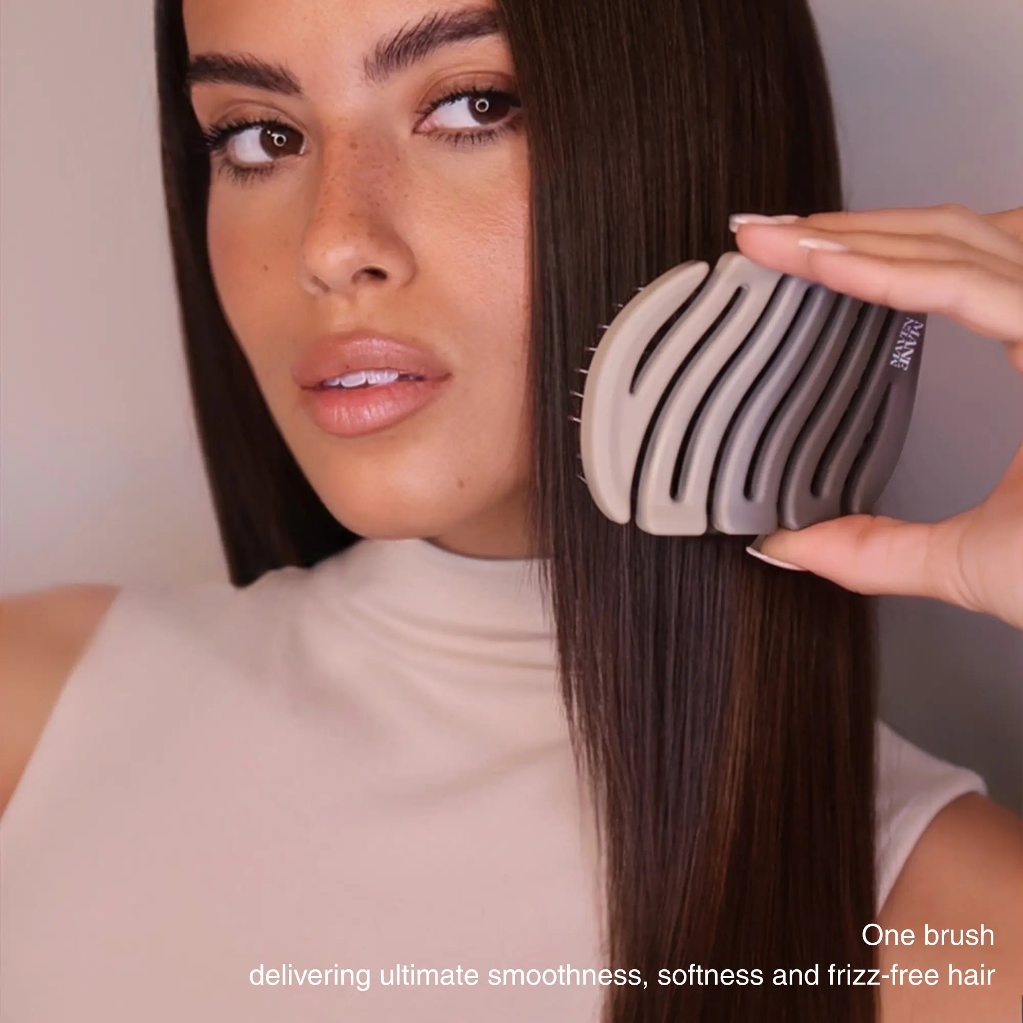 Model using ZIGZAG Travel Hair Brush on straight hair for effortless detangling, smoothing, and frizz-free results.