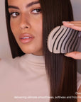Model using ZIGZAG Travel Hair Brush on straight hair for effortless detangling, smoothing, and frizz-free results.