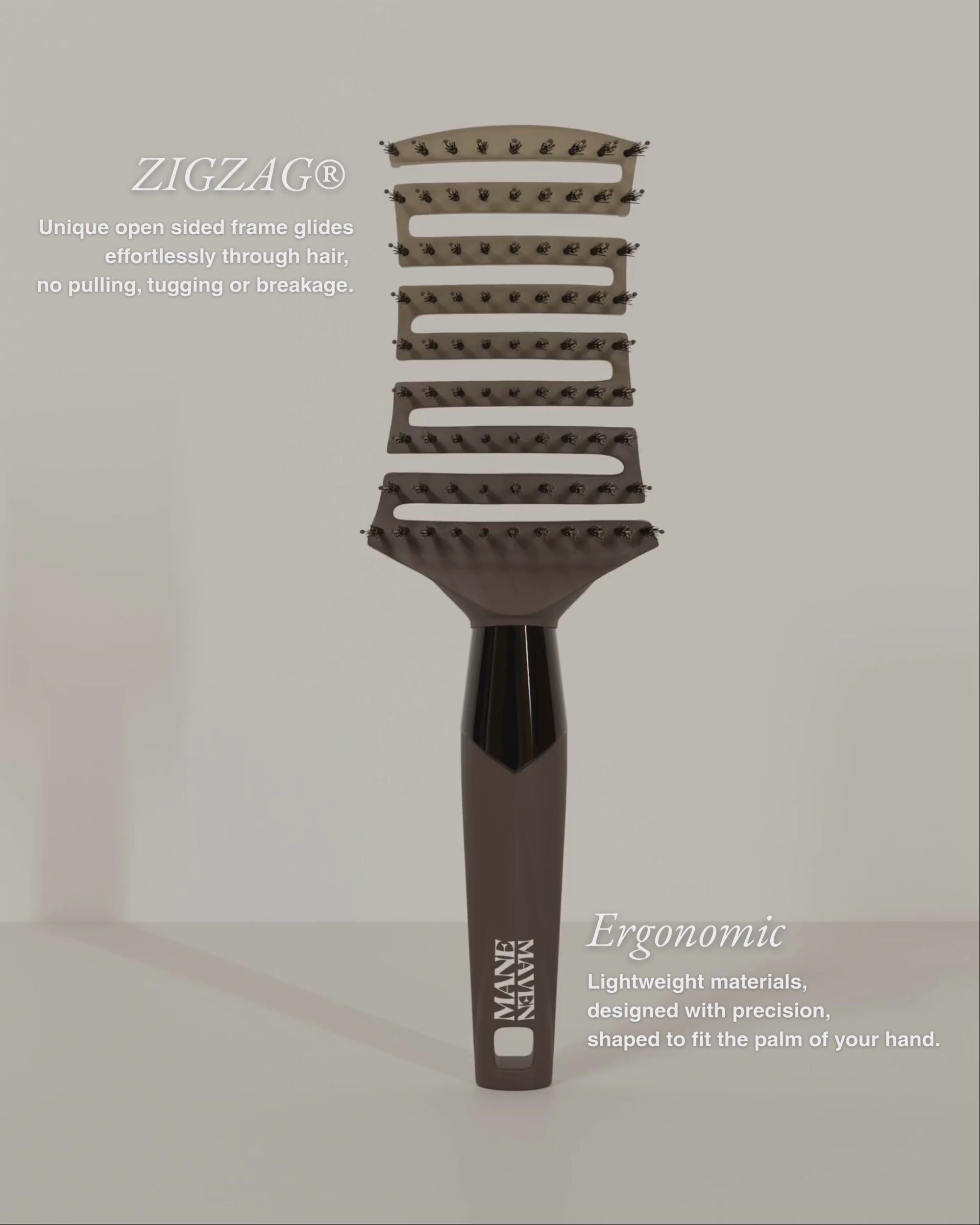 Close-up of ZIGZAG Brush effortlessly detangling hair with no pulling, tugging, tension, or breakage.
